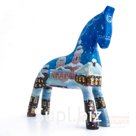An azure blue horse with a cityscape