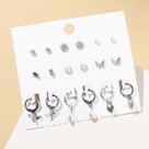Набор серьги 9 пар "Цацки" бабочки, цветок, цветные в серебре