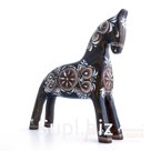 A bay horse with a light coffee-colored pattern