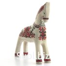 White horse with red and black decor