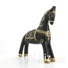 Black horse with beige and gold pattern