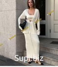 Вязаные комплекты, состоящие из кардигана, юбки и топа.